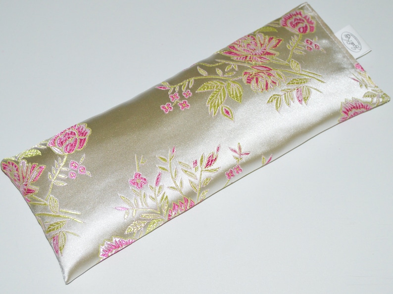 silver satin eye pillow with flax seed and optional lavender buds