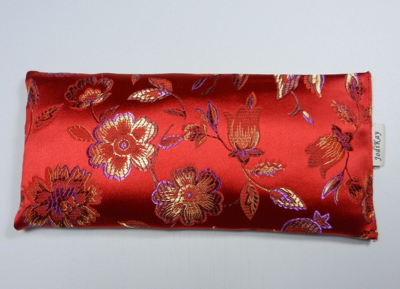 red satin eye pillow with flax seed and optional lavender buds