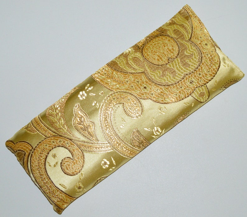 gold satin eye pillow with flax seed and optional lavender buds