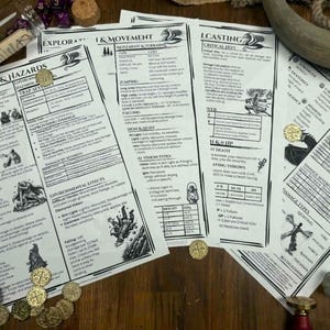Peut inclure: Plusieurs feuilles de jeu imprimées avec du texte et des illustrations en noir, avec des titres tels que "Explorations & Hazards" et "I & Movement". Des pièces d'or et des dés sont éparpillés sur les feuilles sur une surface en bois. Une fiole en verre avec du contenu vert est visible.