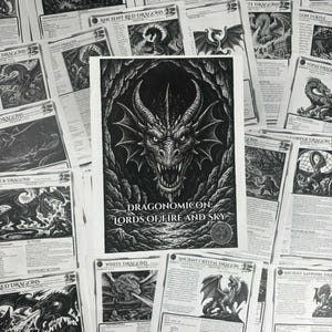 May include: A collection of black and white fantasy art prints featuring various dragon illustrations. The central print displays a detailed dragon head with the text "DRAGONOMICON: LORDS OF FIRE AND SKY". Surrounding prints showcase different dragon types.