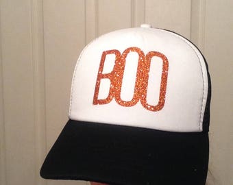 Black, white, and orange womens glitter Halloween trucker hat