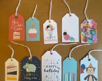 10 - Assorted cardstock birthday tags with string