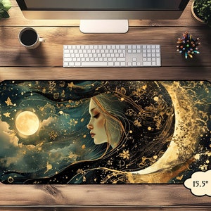 May include: A dark green and gold mousepad with a crescent moon and a woman's face with flowing hair. The design is reminiscent of a starry night sky. The mousepad measures 15.5 inches by 31 inches.