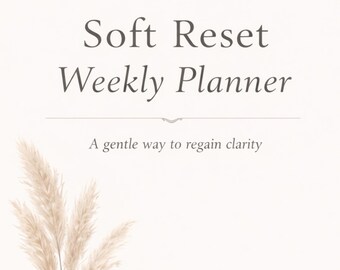 May include: A cream-colored weekly planner with the text "Soft Reset Weekly Planner" in a dark gray font. The phrase "A gentle way to regain clarity" is below the title. Beige pampas grass is in the lower left corner. The words "Soft Reset Club" are at the bottom.