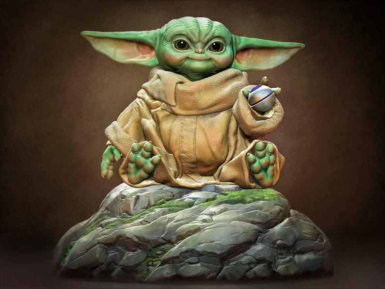 May include: A green and brown figurine of a character from the Star Wars franchise, sitting on a rock with a small silver ball in its hand.