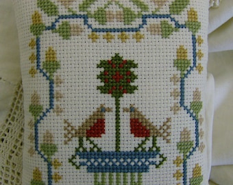 Cross Stitch decorative pillow tuck