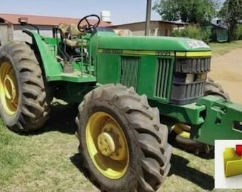 Operator’s Manual For John Deere 6205 and 6505 Tractors.