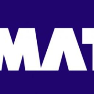 May include: The word "KOMATSU" in bold white letters is displayed against a dark blue background. The registered trademark symbol is in the upper right corner of the "SU".