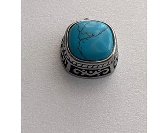 Colgante artesanal vintage de turquesa de Bali: filigrana y volutas artesanales