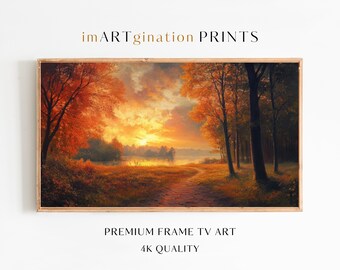 Pode incluir: Uma impressão emoldurada de uma paisagem com um pôr do sol sobre um caminho que leva a um corpo de água. A obra de arte apresenta árvores com folhagem laranja e vermelha outonal. O texto "imARTgination PRINTS" está no topo e "PREMIUM FRAME TV ART" e "4K QUALITY" na parte inferior.