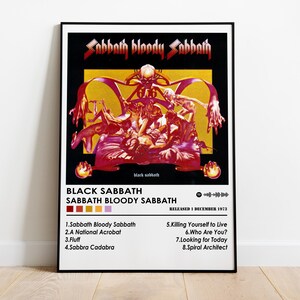 May include: Black Sabbath "Sabbath Bloody Sabbath" album art poster. The poster features the album title and band name in a bold, stylized font. The artwork is a vibrant mix of red, yellow, and purple hues, with a central illustration of figures. The poster is framed in black.
