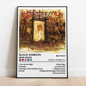May include: Black Sabbath "Mob Rules" album art poster. The poster features the album's artwork with a dark, gritty illustration and the band's name and album title in bold text. Includes tracklist and release date.