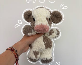 Coccolone a forma di mucca all'uncinetto