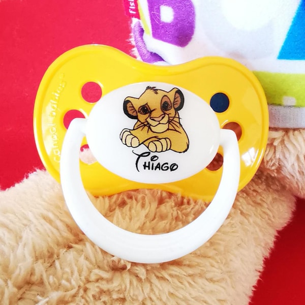 Chupete personalizado del Rey León con nombre E18