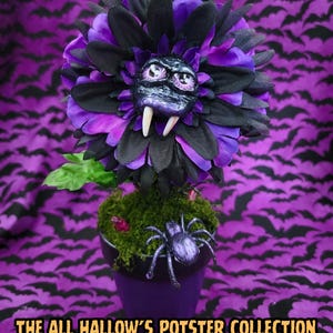 May include: A purple flower with black petals and a central creature face featuring two white fangs, positioned in a purple pot filled with green moss and a small purple spider. Text reads: THE ALL HALLOW'S POTSTER COLLECTION ARTWORK BY LIVING DEAD GIRL NICOLE.