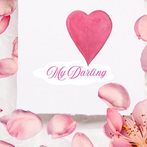 Könnte beinhalten: Eine weiße Karte mit einem rosa Aquarellherz und dem Text "My Darling" in rosa Schrift.