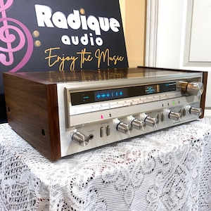 Receptor Pioneer SX-3600 vintage: 30 W, pantalla Fluoroscan, laterales enchapados en nogal, con servicio técnico, cara plateada