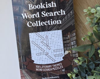 May include: A "Bookish Word Search Collection" book with a library scene on the cover. The book features 100 literary-themed word search puzzles and contains 2000 words. The cover also includes the text "The Bookish BestieCo."