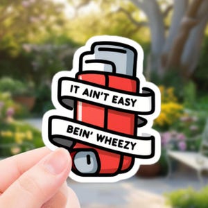 It Ain’t Easy Being Wheezy – Funny Asthma Inhaler Vinyl Sticker | Ideal for laptops, waterbottles, journals or as a gift