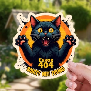 May include: A sticker depicting a black cat with yellow eyes and an open mouth, set against an orange background with black splatters. The text "ERROR 404 SANITY NOT FOUND" is written below the cat.