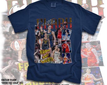 May include: A navy blue t-shirt with a graphic print of basketball players. The text "Caitlin Clark" and "From the Logo!" are printed on the shirt.