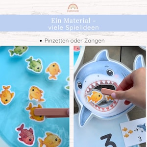 May include: A children's educational game featuring a blue water-filled basin with floating colorful fish cutouts, a shark-shaped container with an open mouth, and pink plastic tweezers used to pick up the fish pieces for counting activities.