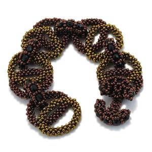 May include: A brown and gold beaded bracelet with black beads. The bracelet is made of small, round beads that are woven together in a intricate pattern.
