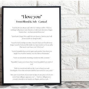 May include: Black framed print with the text "I love you" from Blood & Ash Casteel. The print features a poem with romantic verses in a clean, modern font. The background is a white brick wall.