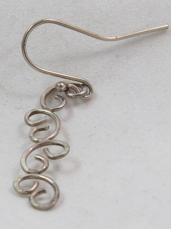 Shank handcrafted sterling silver earring