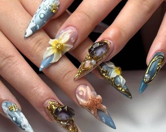 AuritaNailのホワイトパールシェルプレスオンネイル｜ヒトデと