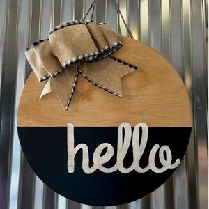 Hello Door Sign – Light Wood Round with Buffalo Plaid and Burlap Bow – Farmhouse Porch Decor – Front Door Hanger – Year-Round Sign