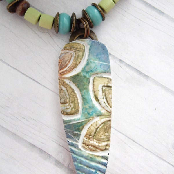 Polymer Clay Pendant featuring Tropical Bohemian Teal, Gold and White Batik Abstract Leaf Design