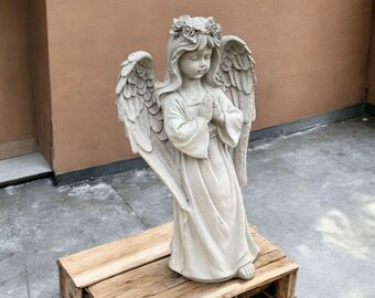 Outdoor angel figure Yard cherub ornament Lawn religious statue Garden angel art Concrete cherub idea Angel girl figure Stone cherub decor