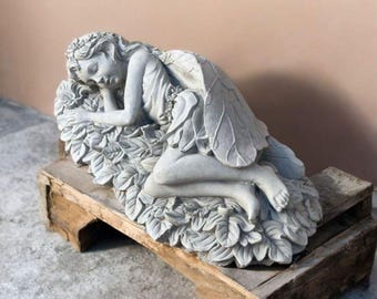 Garden pixie figure Concrete fairy decor Stone pixie statue Outdoor fairy ornament Sleeping pixie sculpture Lawn fairy art Pixie yard idea