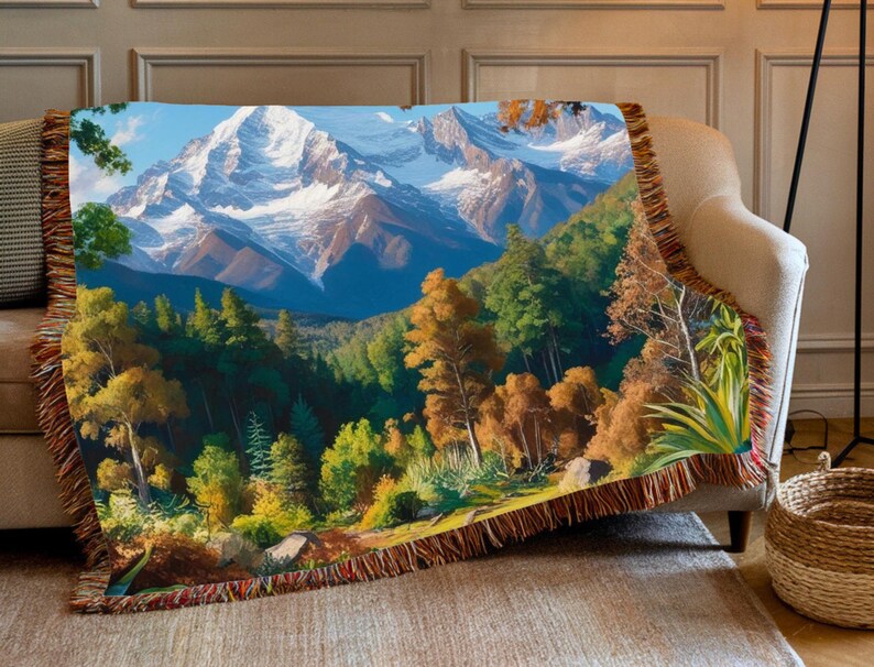 A beautiful vivid display of a mountainous background with a forest setting. Stitched scenic display of nature makes this comfy woven blanket perfect for all nature enthusiasts, and as a home decor gift. Great for a cozy night in.