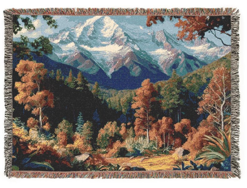 A beautiful vivid display of a mountainous background with a forest setting. Stitched scenic display of nature makes this comfy woven blanket perfect for all nature enthusiasts, and as a home decor gift. Great for a cozy night in.