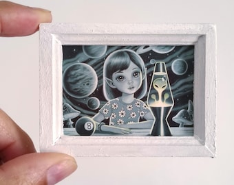Do Aliens Exist? (White Frame) - Mini Print by Ana Bagayan 2026