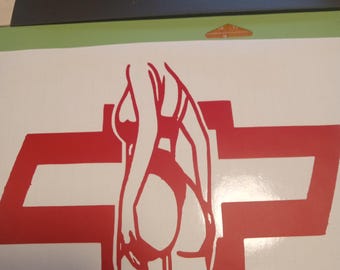 May include: A red vinyl decal featuring a stylized image of a woman over a red Chevrolet logo. The woman's silhouette is depicted in a suggestive pose. The decal is on a white background.