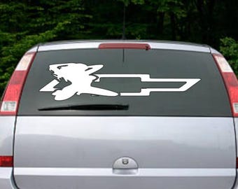 May include: White vinyl decal of a stylized animal with a Chevrolet bowtie on a silver car's rear window.