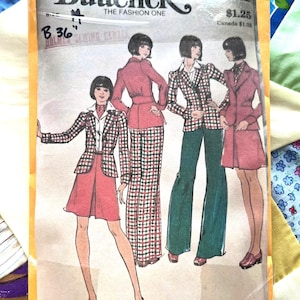 May include: Vintage Butterick sewing pattern featuring illustrations of women's suits and dresses. The pattern includes a variety of styles, including a skirt suit, pantsuit, and dress. The cover has the text "Butterick THE FASHION ONE" and the size is B 36.