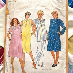 May include: Vintage Terick sewing pattern packet, size 14, featuring illustrations of four different dress designs. The packet has a worn appearance and includes text indicating the price in Australian and New Zealand currency.