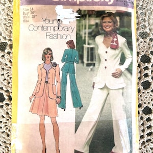 May include: Vintage Simplicity sewing pattern envelope. The envelope features illustrations of women's fashion designs, including a white suit and a pink skirt suit. Text on the envelope reads "Young Contemporary Fashion" and "Size 14, Bust 36", Waist 28" Miss."