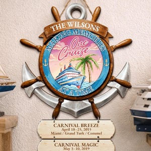 May include: Wooden cruise ship-themed wall decor featuring a ship wheel, anchor, and the text "THE WILSONS MAKING MEMORIES One Cruise AT A TIME." Includes four wooden plaques with cruise details.