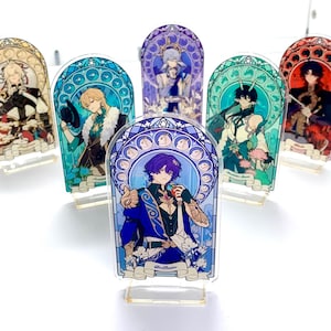 May include: A collection of anime-style acrylic standees, each featuring a character in a stained-glass window design. The standees showcase various characters with detailed outfits and vibrant colors, set on clear acrylic bases.