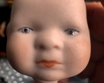 Pair of Adorable Hand Painted Bisque Infant Doll Heads