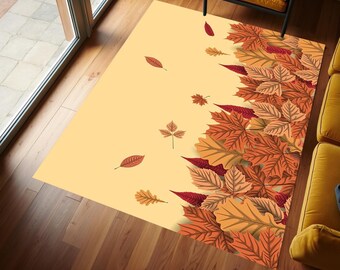 May include: A beige area rug featuring a pattern of red and orange autumn leaves. The leaves are arranged in a cascading design along the right side of the rug.