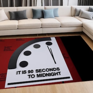 May include: A red and black area rug with a white clock face featuring a black Doomsday Clock. The clock face reads "It is 90 seconds to midnight".