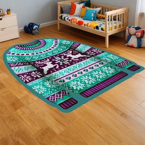 May include: A teal and purple patterned rug with a snowflake and reindeer design. The rug is shaped like a sweater.