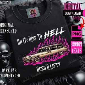 May include: Black sweatshirt with the text "On My Way To Hell" and a hearse graphic engulfed in pink flames. The phrase "Need a Lift?" is below the hearse. The design is recommended for dark fabrics.